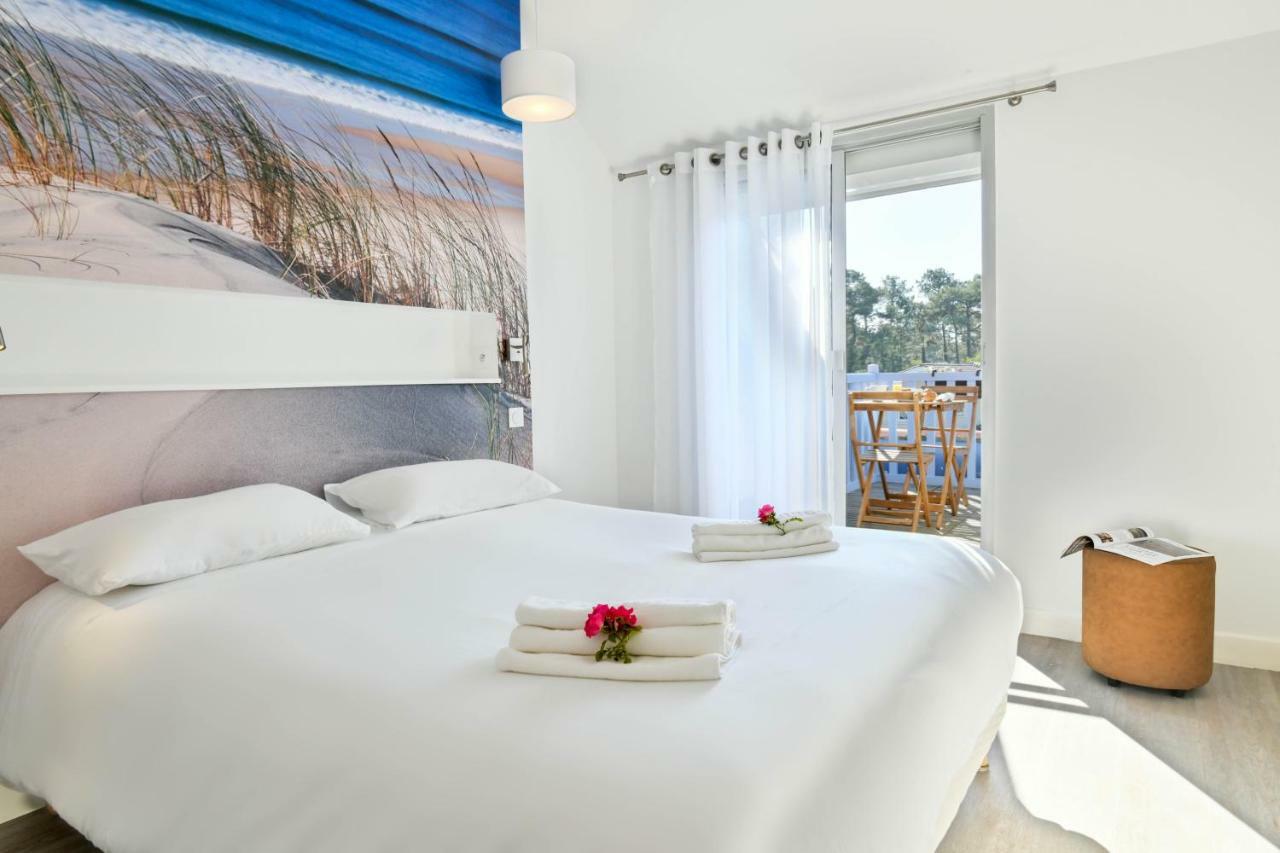 Les Vagues Hotel Restaurant Biscarrosse-Plage Exterior foto